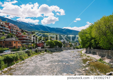 Eisack river flowing through Brixen toward alpine valley, South Tyrol Eisack river flowing through Brixen toward alpine valley, South Tyrol 143902747