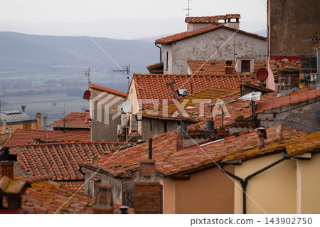 Old village rooftops in Scarlino, Tuscany 143902750