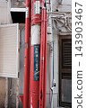 Walking through the back streets of Kobe's Chinatown, Nankinmachi. 143903467