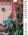 Walking through the back streets of Kobe's Chinatown, Nankinmachi. 143903478