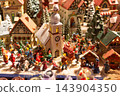 Miniature Christmas Village Decorations at Salzburg Christmas Market in Austria 143904350