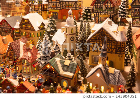 Miniature Christmas Village Decorations at Salzburg Christmas Market in Austria Miniature Christmas Village Decorations at Salzburg Christmas Market in Austria 143904351