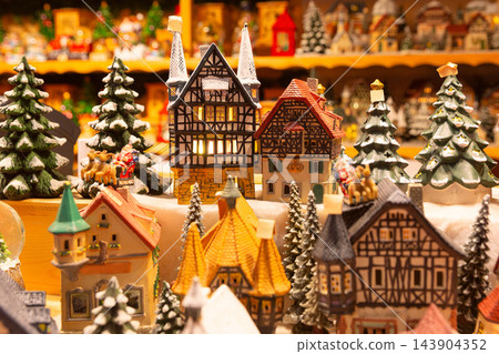Miniature Christmas Village Decorations at Salzburg Christmas Market in Austria Miniature Christmas Village Decorations at Salzburg Christmas Market in Austria 143904352