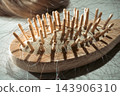 Hair loss; hair tangled in a hairbrush 143906310