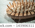 Hair loss; hair tangled in a hairbrush 143906311