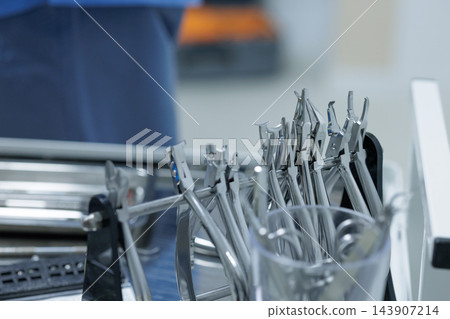 Dental instruments arranged in a treatment unit represent advanced dentistry, clinical precision, and professional equipment for oral healthcare campaigns. Dental instruments arranged in a treatment unit represent advanced dentistry, clinical precision, and professional equipment for oral healthcare campaigns. 143907214