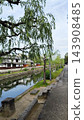 The streetscape of the Kurashiki Bikan Historical Quarter and the willow trees along the Kurashiki River 143908485