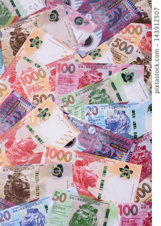 Hong Kong paper money, dollar banknotes and cent coins as currency for exchange or travel Hong Kong paper money, dollar banknotes and cent coins as currency for exchange or travel 143912507
