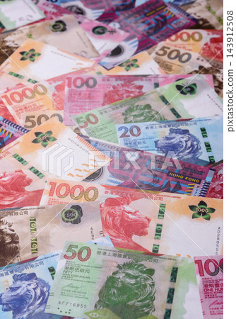 Hong Kong paper money, dollar banknotes and cent coins as currency for exchange or travel 143912508
