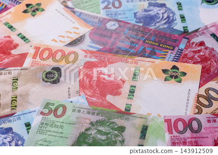 Hong Kong paper money, dollar banknotes and cent coins as currency for exchange or travel 143912509