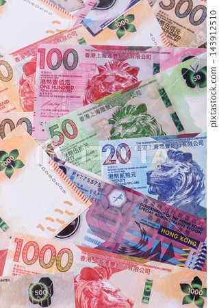 Hong Kong paper money, dollar banknotes and cent coins as currency for exchange or travel 143912510