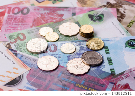 Hong Kong paper money, dollar banknotes and cent coins as currency for exchange or travel 143912511