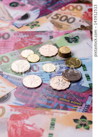 Hong Kong paper money, dollar banknotes and cent coins as currency for exchange or travel Hong Kong paper money, dollar banknotes and cent coins as currency for exchange or travel 143912513