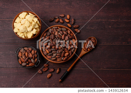Roasted or raw cacao beans for making powder and chocolate. Cacao beans 143912634