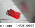 Fireproof gloves on the ground 143919695