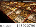 Traditional Arab sweets (lokum, nougat, sugar-coated nuts) are sold in the markets of Dubai. 143920790