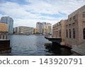 Old city and waterfront scenery along Dubai Creek 143920791
