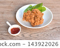 crispy fried chicken tight with fresh cos lettuce salad on plate dipping ketchup 143922026