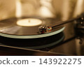 The moment the needle touches the record (on a record player) 143922275