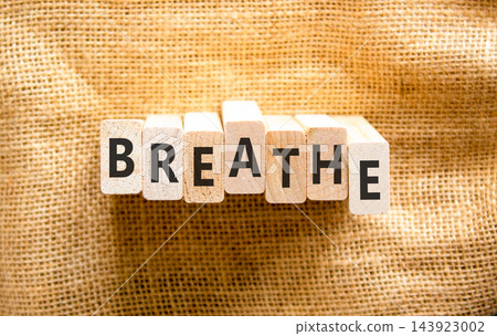Breathe word symbol. Concept word Breathe on beautiful wooden blocks. Beautiful canvas background. Business medical breathe word concept. Copy space. Breathe word symbol. Concept word Breathe on beautiful wooden blocks. Beautiful canvas background. Business medical breathe word concept. Copy space. 143923002