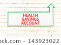 Health saving account symbol. Concept words Health saving account on beautiful white information sign. Beautiful white brick wall background. Medical Health saving account concept. Copy space. 143923022