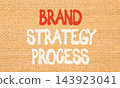 Brand strategy process words symbol. Concept words Brand strategy process on beautiful brick wall. Beautiful brick wall background. Business and brand strategy process concept. Copy space. 143923041