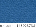 Texture of blue waffle weave kitchen towel. Cloth, fabric with checked diagonal grid pattern 143923738