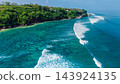 Tropical landscape with green cliff and turquoise ocean in Bali 143924135