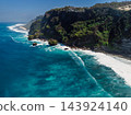 Landscape with rocky cliff coastline and blue ocean with waves. Drone view 143924140