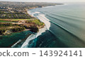 Drone view of coastline with long surfing waves. Perfect swell in Bali 143924141