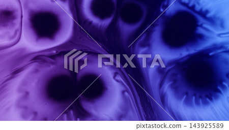 Paint spatter. Fluid spill. Blur purple blue neon color water chemical bubbles pigment drop spreading on abstract acrylic background. Paint spatter. Fluid spill. Blur purple blue neon color water chemical bubbles pigment drop spreading on abstract acrylic background. 143925589