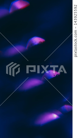 Reflection lens blur. Neon light leak. Color flash flicker double optical glow. Futuristic violet purple shiny kaleidoscope abstract black background. Reflection lens blur. Neon light leak. Color flash flicker double optical glow. Futuristic violet purple shiny kaleidoscope abstract black background. 143925592
