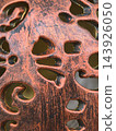 Intricate details of a decorative metalwork with unique patterns 143926050