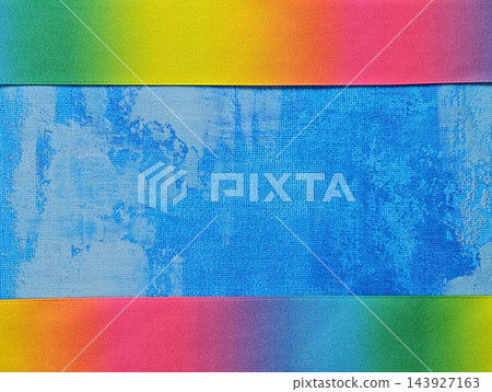 Abstract Blue Canvas Background with Rainbow Fabric Bands Framing  143927163