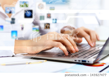 Global Business Technology Concept with Hands Typing on Laptop 143927477