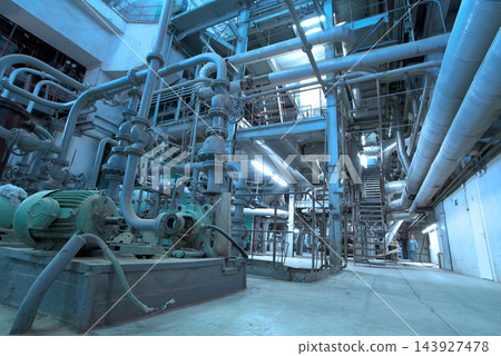 Industrial Plant Interior with Pipes, Valves, and Machinery Industrial Plant Interior with Pipes, Valves, and Machinery 143927478