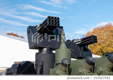 Military armored vehicle turret with twin rocket launcher systems outdoors Military armored vehicle turret with twin rocket launcher systems outdoors 143927581