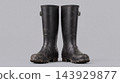 Pair of Muddy Black Rubber Boots for Farming and Gardening on Plain Background 143929877