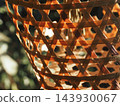 Close-up of traditional woven bamboo basket texture, natural handmade craftwork pattern  143930067