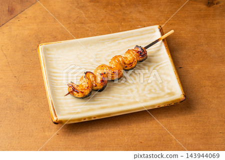 烤鰻魚串香氣撲鼻,非常適合佐酒。 烤鰻魚串香氣撲鼻,非常適合佐酒。 143944069