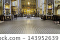 Interior view of a beautiful church showcasing ornate architecture, high ceilings and detailed decorations. Sacred space emphasizing the atmosphere of peace, spirituality and historical character 143952639