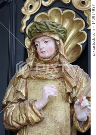 Saint Teresa on the altar of Our Lady of Sorrows, parish Church of the Immaculate Conception of the Virgin Mary in Lepoglava, Croatia 143954957