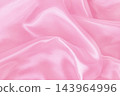 Pink fabric cloth texture for background and design art work, beautiful crumpled pattern of silk or linen. 143964996
