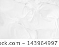 Close up top view of white bedding sheet and wrinkle messy blanket in bedroom after wake up in the morning. 143964997