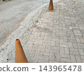 dry leaves on the asphalt road 143965478