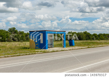 Blue concrete bus stop on rural road in Kostanay Region Kazakhstan Blue concrete bus stop on rural road in Kostanay Region Kazakhstan 143970317