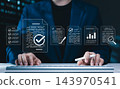 Document review and quality control process concept. Businesswoman using computer with document and checkmark icon represents review, validation, auditing, verification, approval, compliance, workflow 143970541