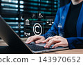 Copyright and intellectual property protection concept. Businesswoman using laptop with icons copyright, intellectual property, legal balance scales, patent, technology law, digital rights, protection 143970652