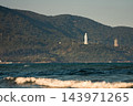 Lady Buddha statue and Linh Ung Pagoda above coastline with sea waves and mountains in Da Nang, Coastal landscape with ocean waves and Son Tra Peninsula, Danang Vietnam 143971265