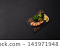 Fish, grilled salmon steak with broccoli, lemon, salt, and spices. Grilled salmon 143971948
